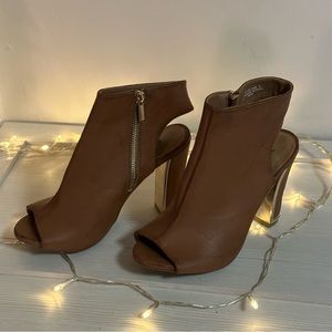 BAMBOO high heeled light brown boots with gold accents.